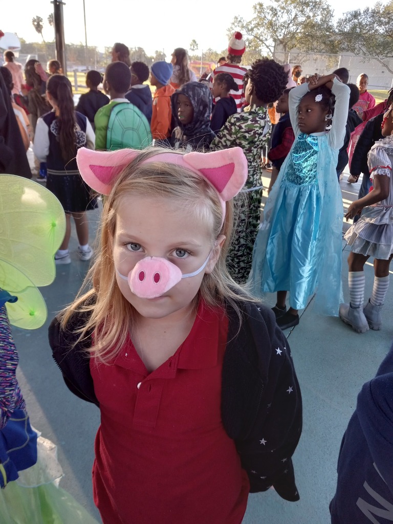 Girl dressed as pig.