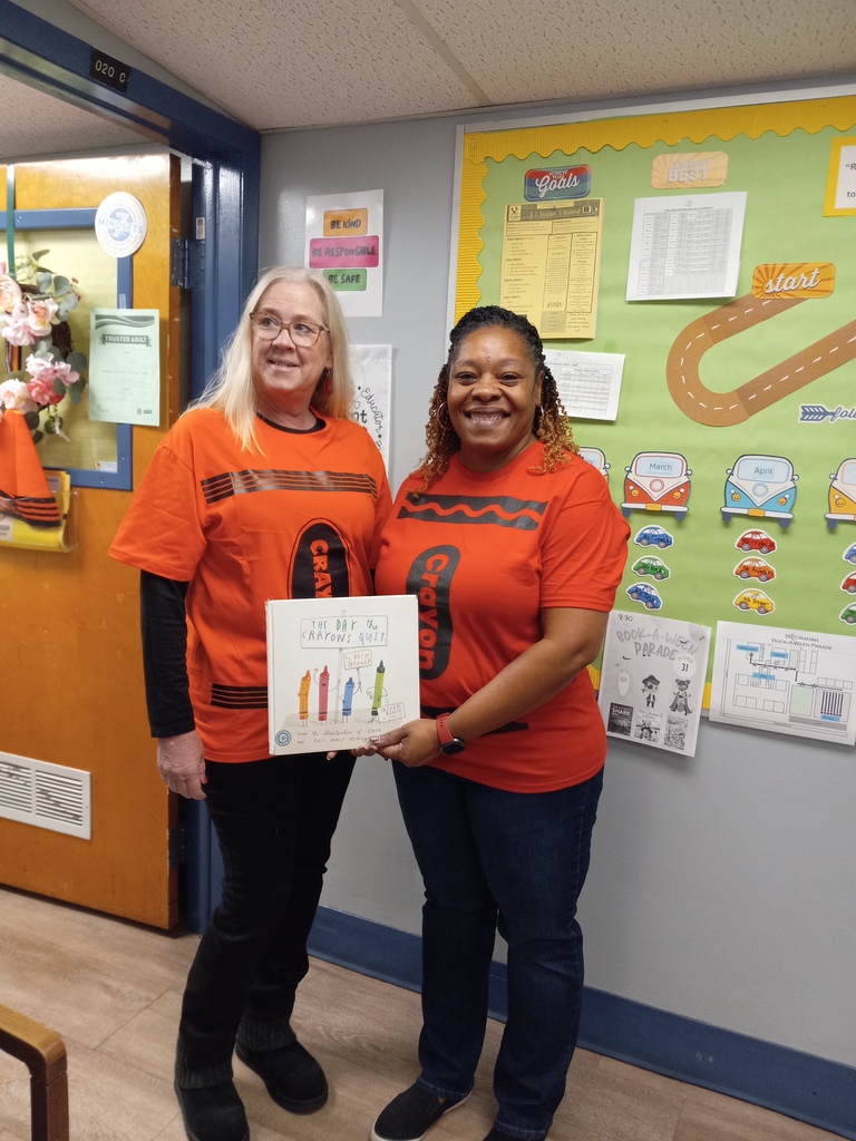 Administrators dressed as crayons.