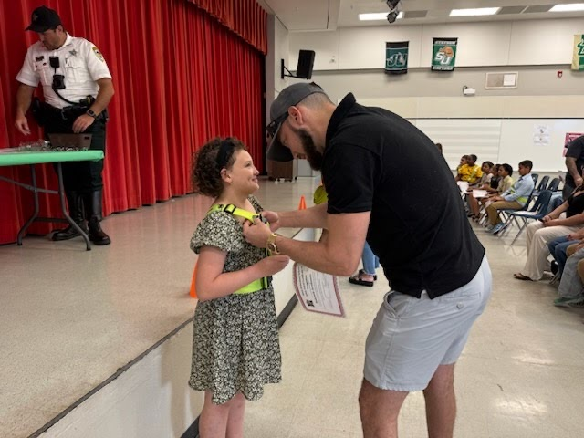 parent pinning badge picture