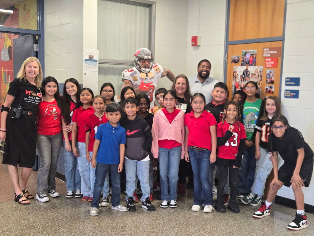 Mr. Butler with our students who were attending an event with Mike Evans and the Tampa Bay Buccaneers.