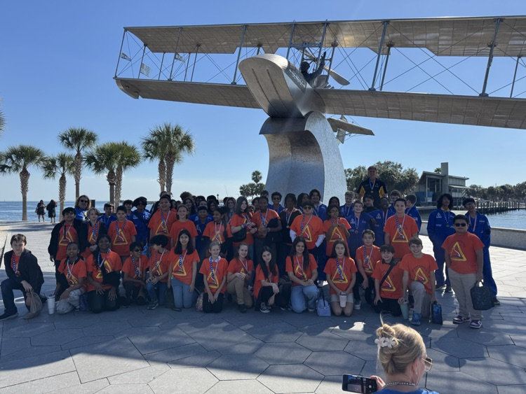 JGTGA student in front of Tony Janus Monument