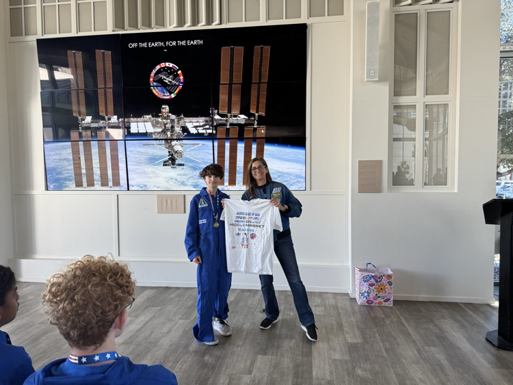 presentation of shirt to Astronaut Nicole Stott