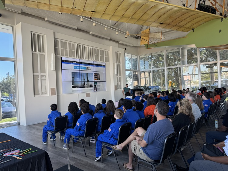 JGTGA students listening to presentations