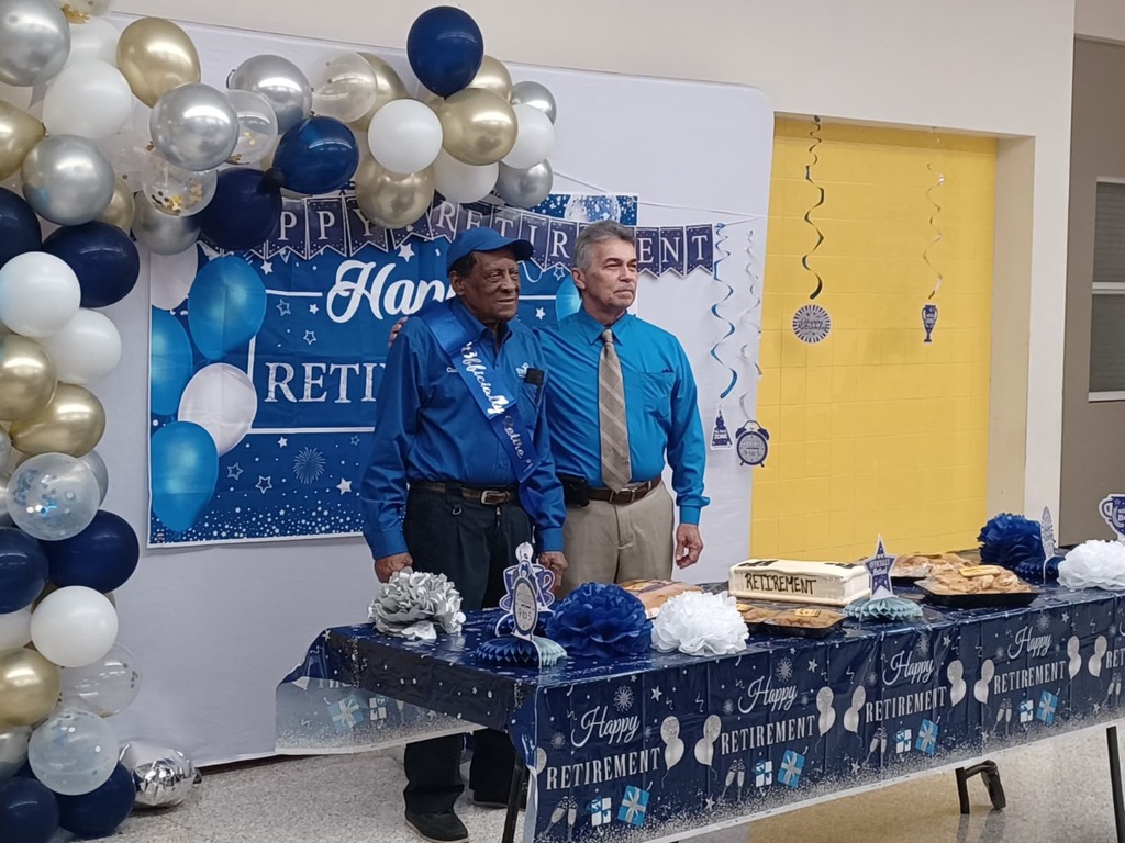 Pipo and head custodian Jeremias Miranda