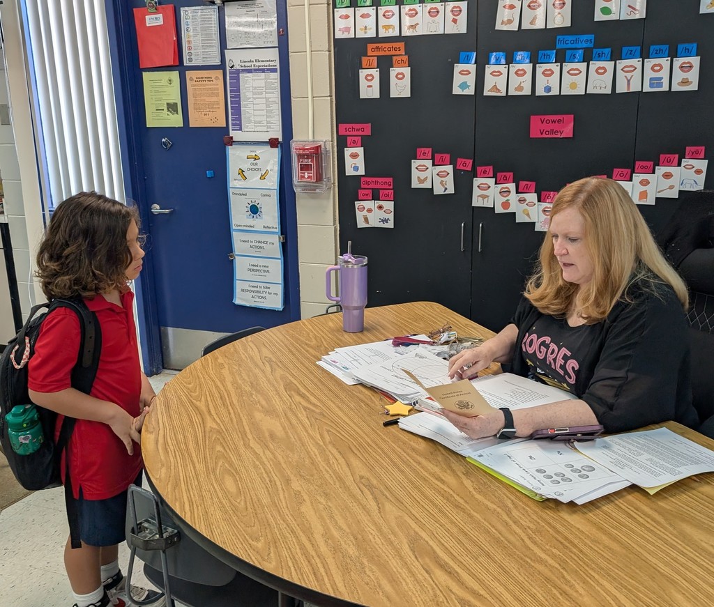 Teacher talking to a student
