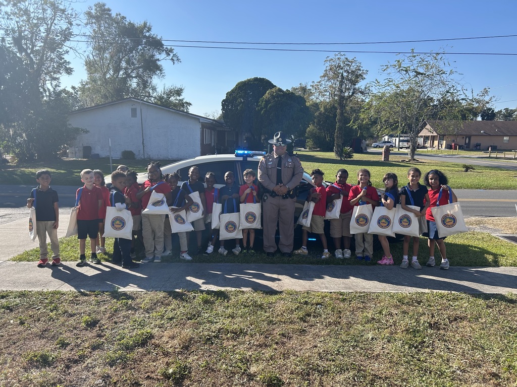 Students with Florida State Trooper