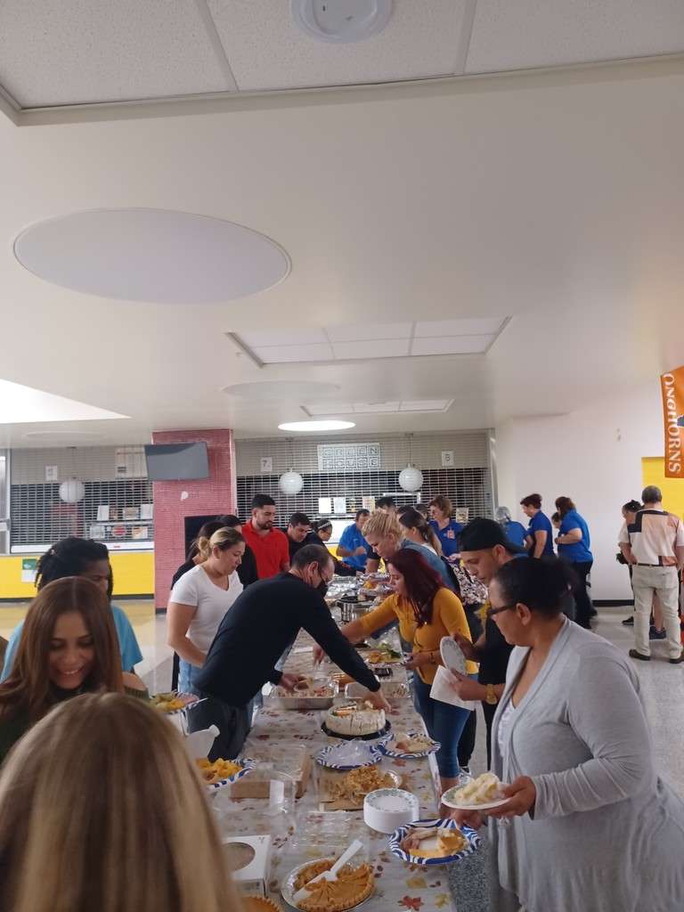Students and staff getting food