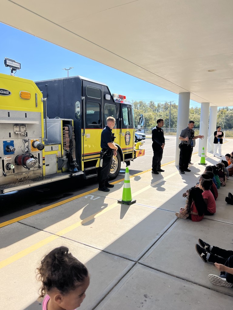 Students and a firetruck