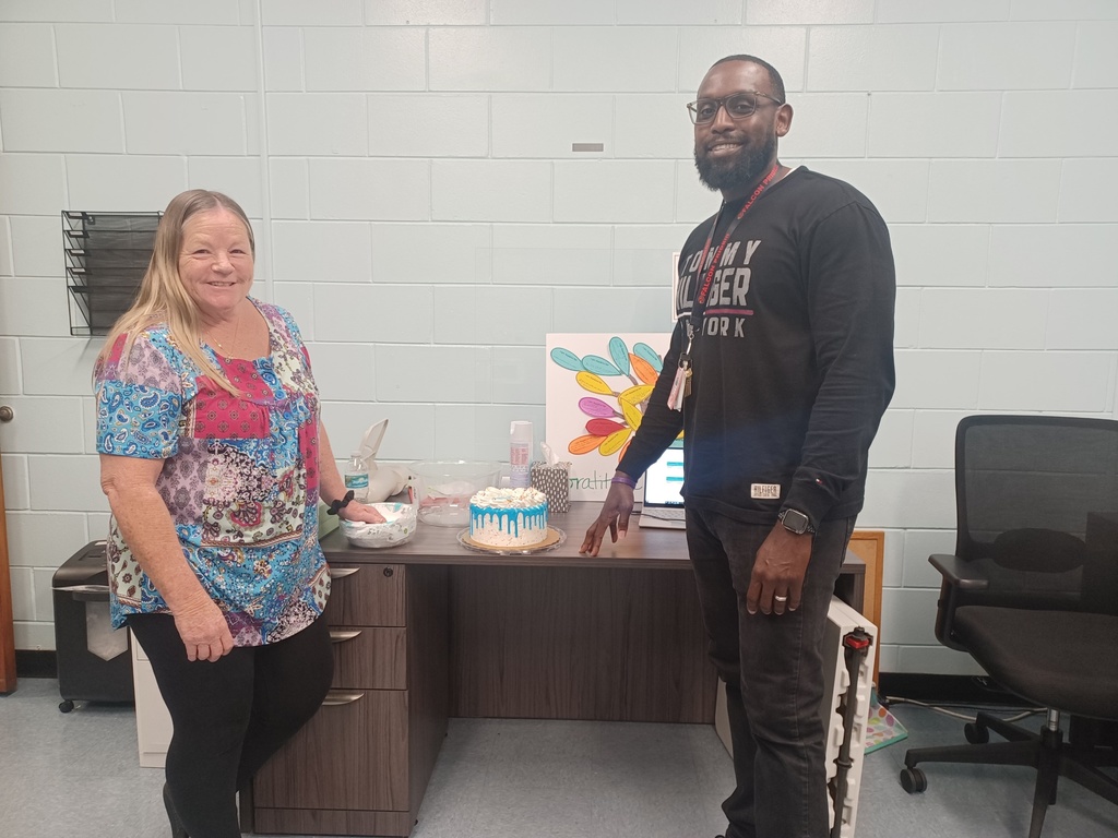 Mr. Parker and Ms. Dawn Diaz with cake