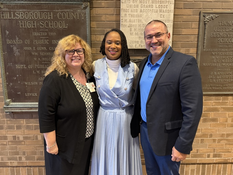Asya Adkins-Cenatus with former Oak Park principal Ryan Moody and regional superintendent Sharon Waite