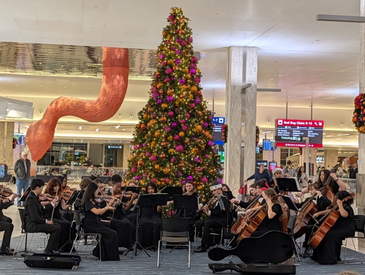 Orchestra performing at airport