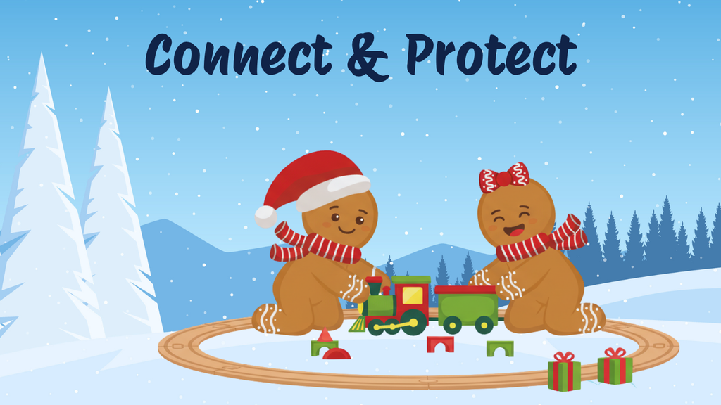 Gingerbread people playing with a train set