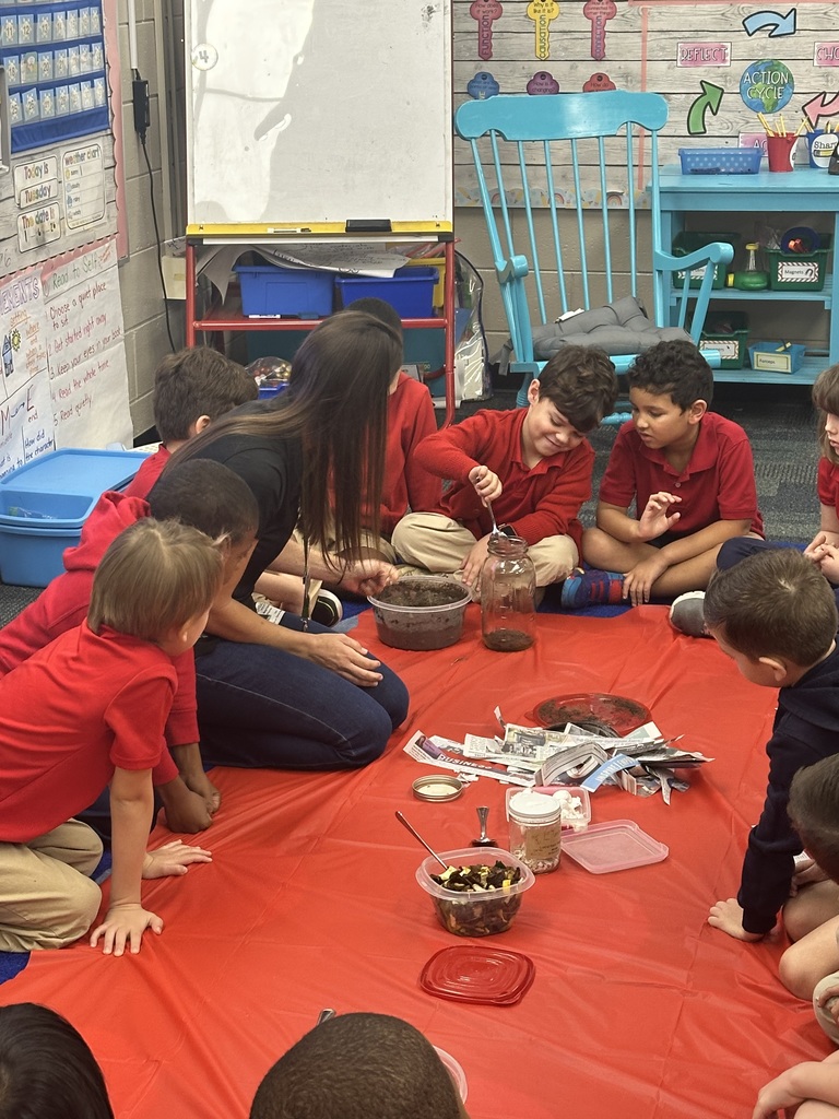 first graders composting