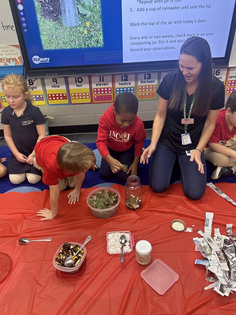 first graders composting