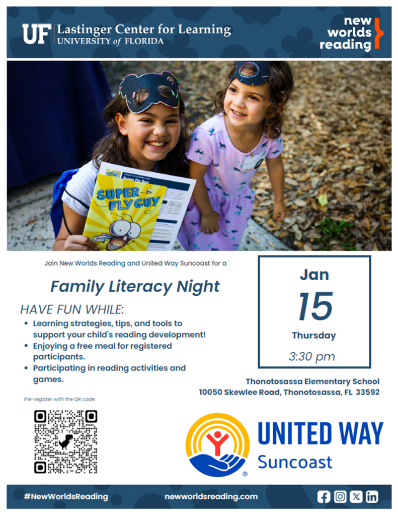 Two students walking together, one student with a yellow Super Fly Guy book 