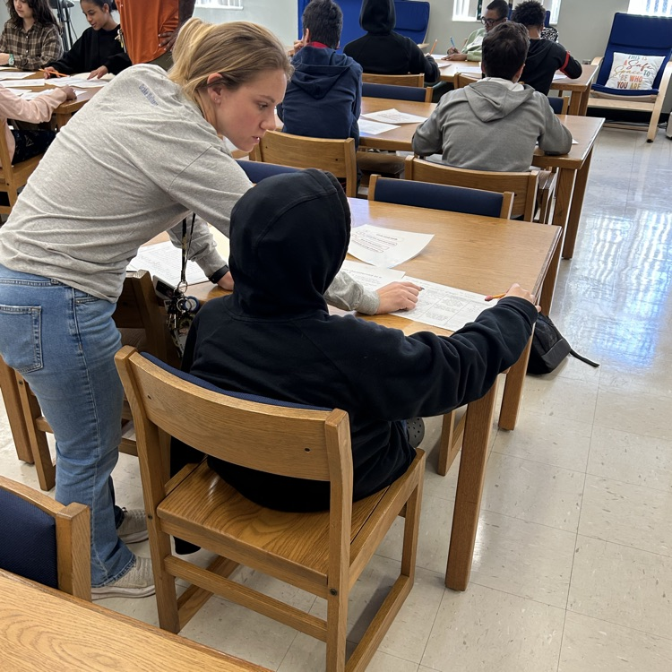 Mrs. Blackwood guiding one of our students to success!