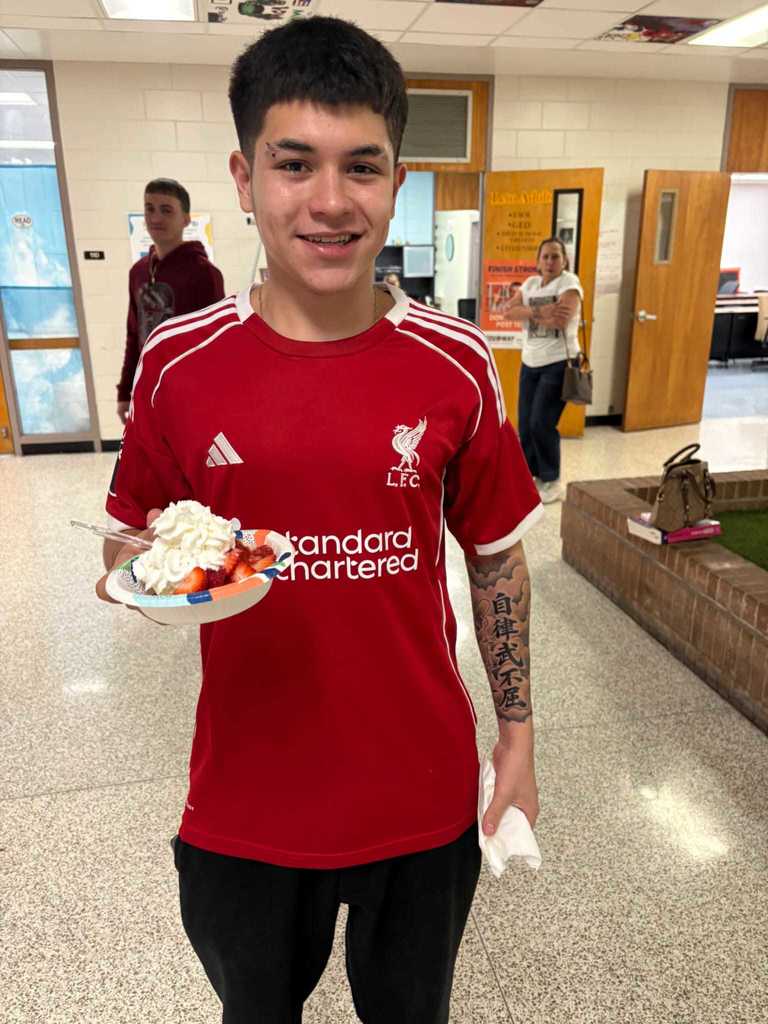 student with shortcake