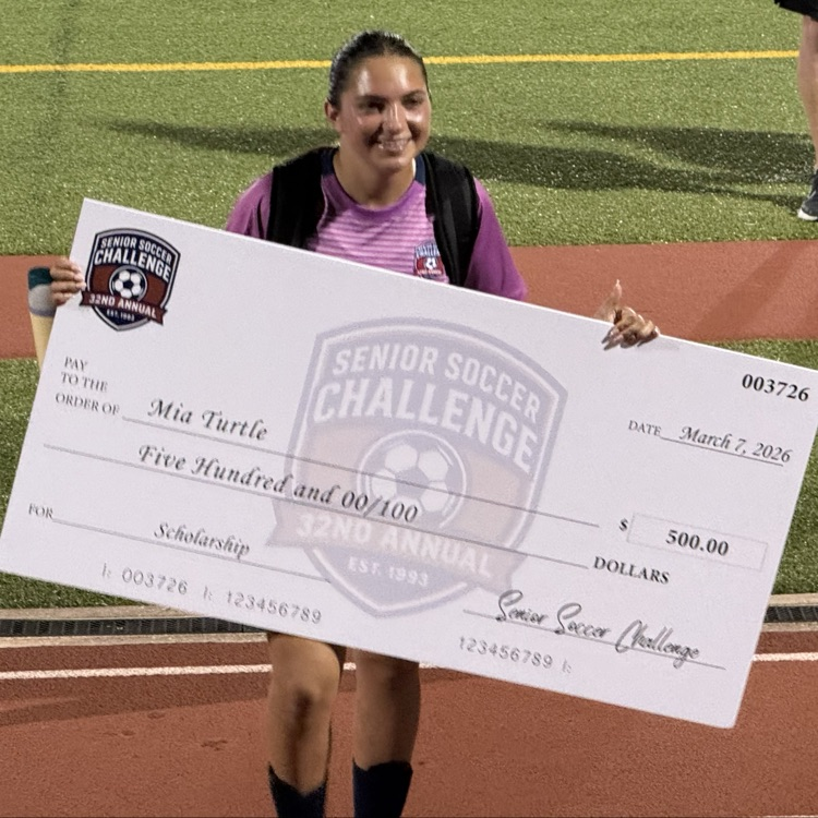 Mia winning $500 Scholarship 