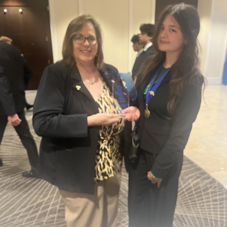 Charlotte and Ms. Harmon DECA