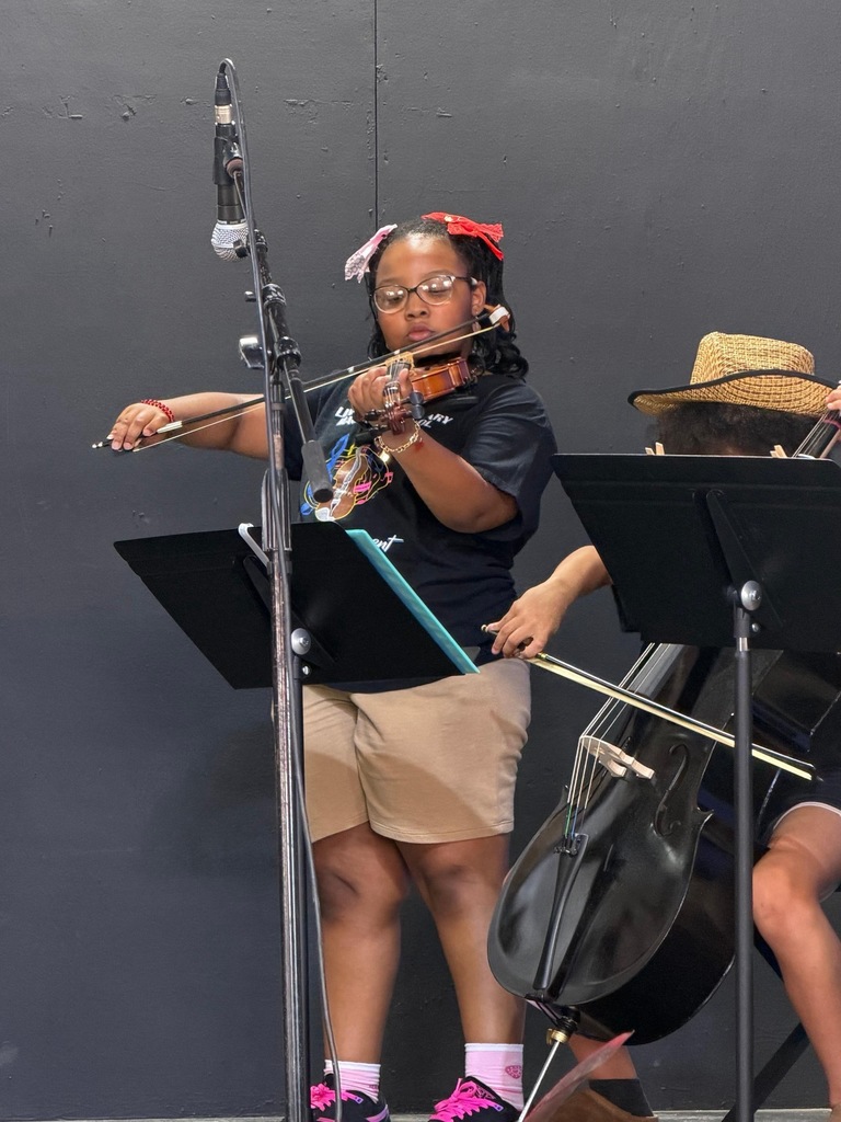A student playing the violin