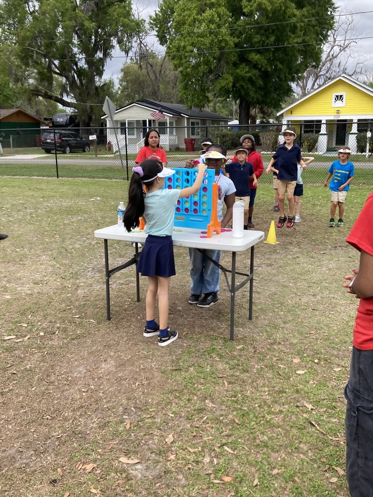 Students playing connect four