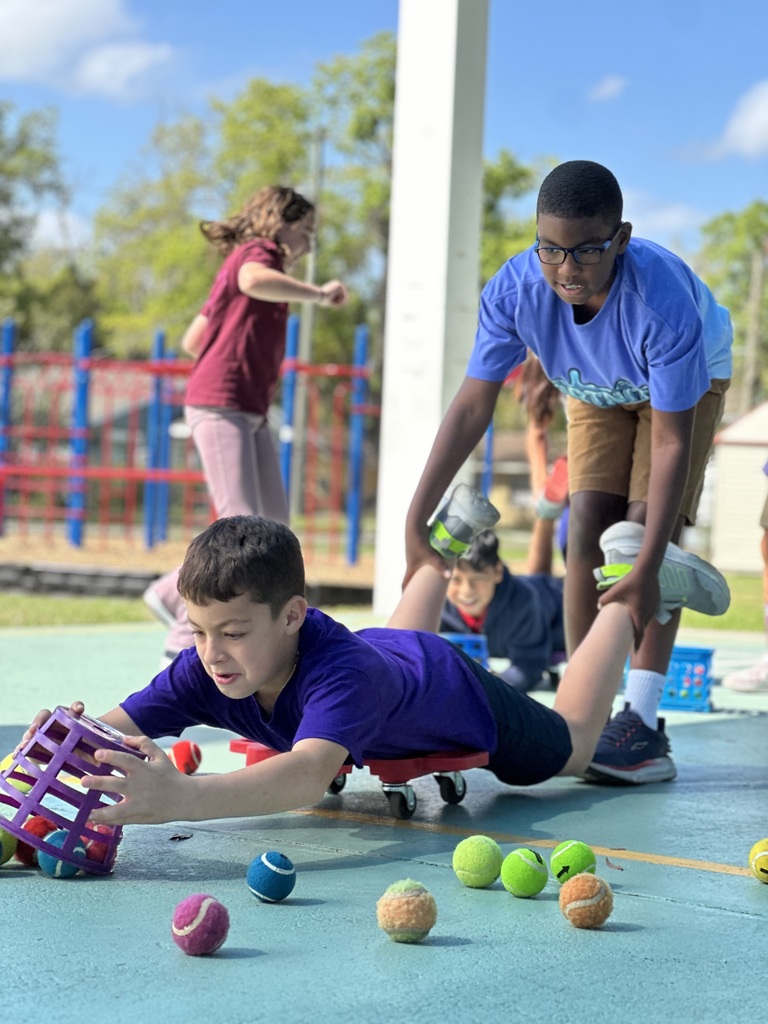 Students playing hungry hippo