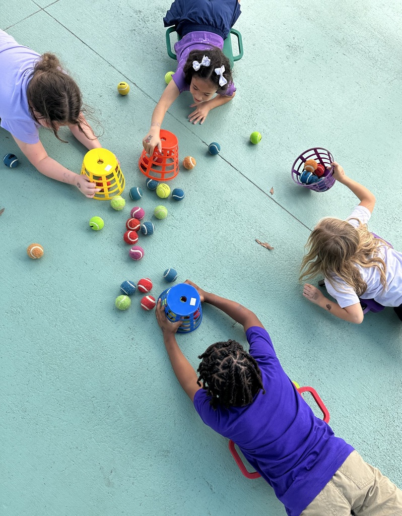 Students playing hungry hippo
