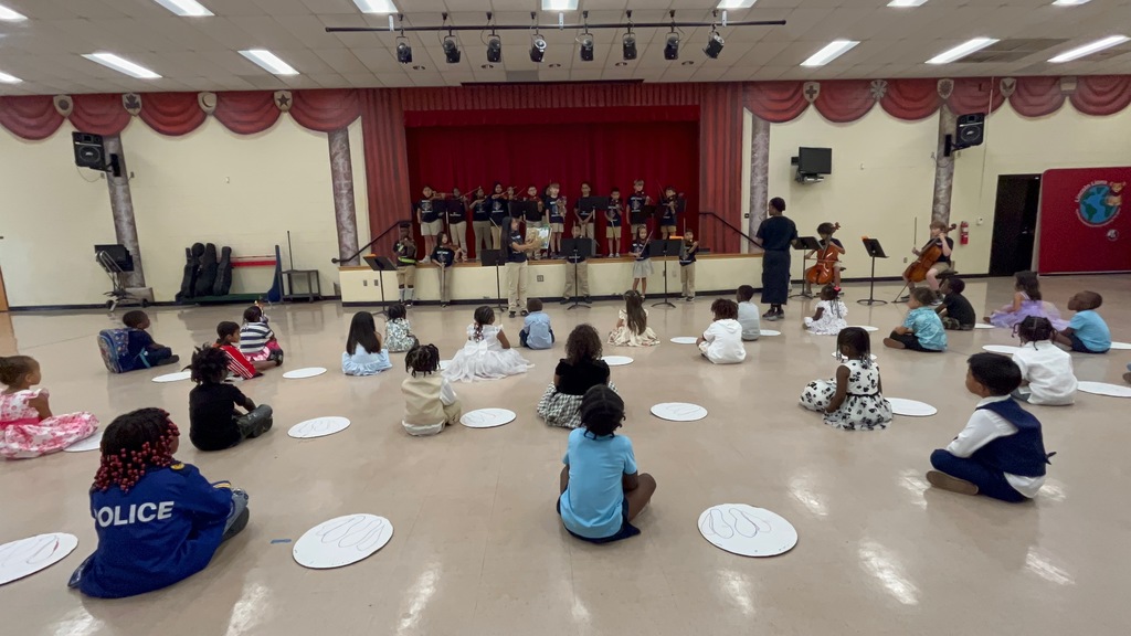 Students watching a performance