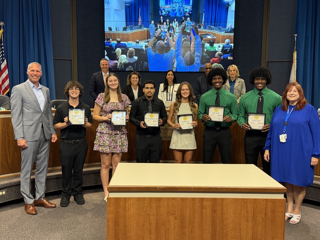 Group of students who are celebrating earning perfect attendance from K-12 