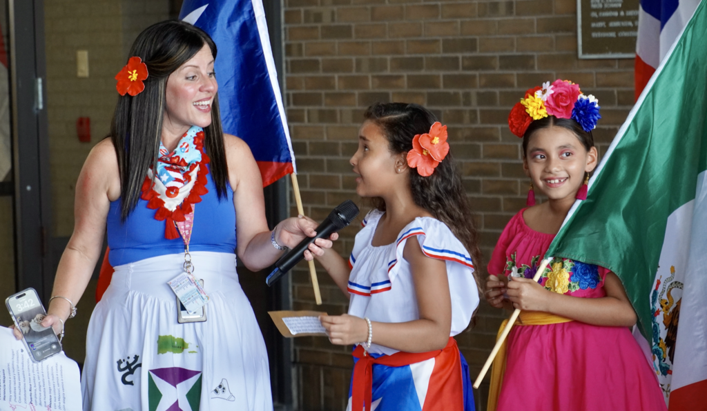 Reddick Elementary School Dual Language students performing  at HCPS Board Meeting