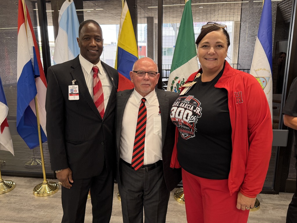 Hillsborough Principal Kevin Gordon, Assistant Principal Miranda Martin, and Head Football Coach Earl Garcia Jr. 