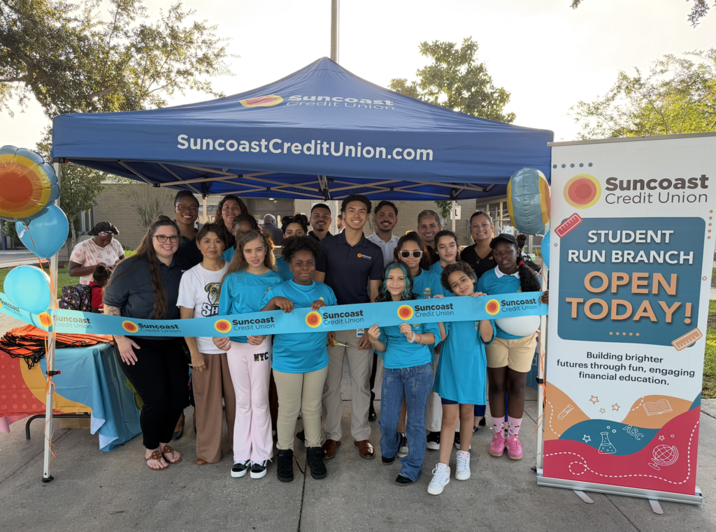 Staff and students celebrating Shaw Elementary School's Student-Run Branch grand opening