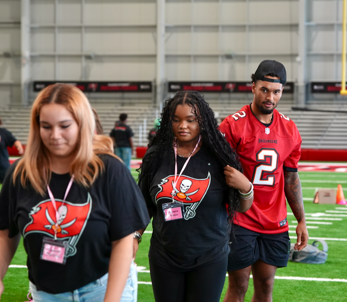 Students and Bucs player at Student-Player Mentoring Program