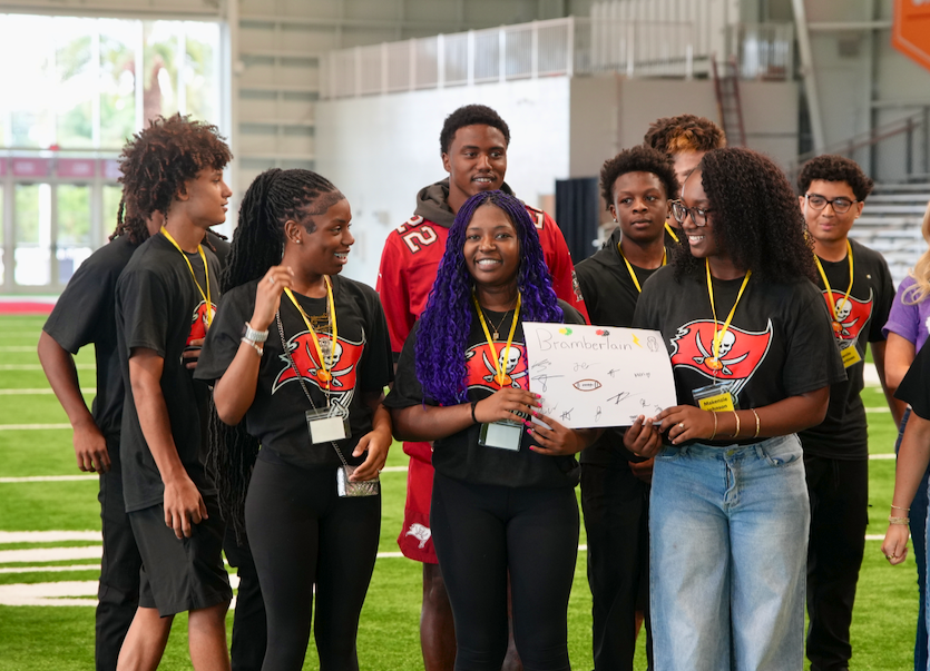 Students and Bucs player at Student-Player Mentoring Program