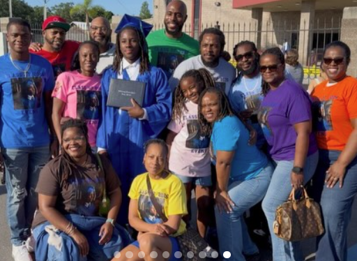 family after graduation smiling