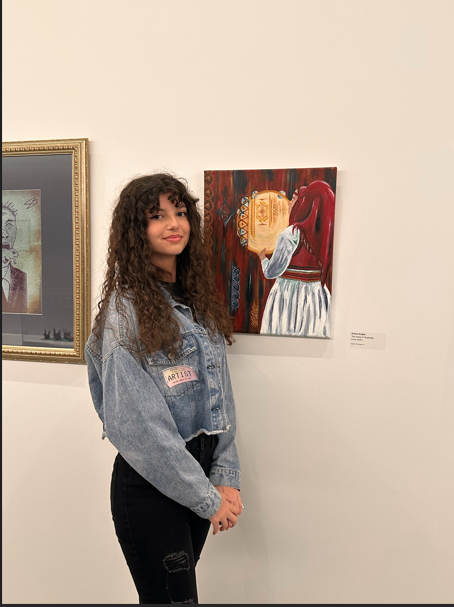 Anesa Gogiqi with art piece