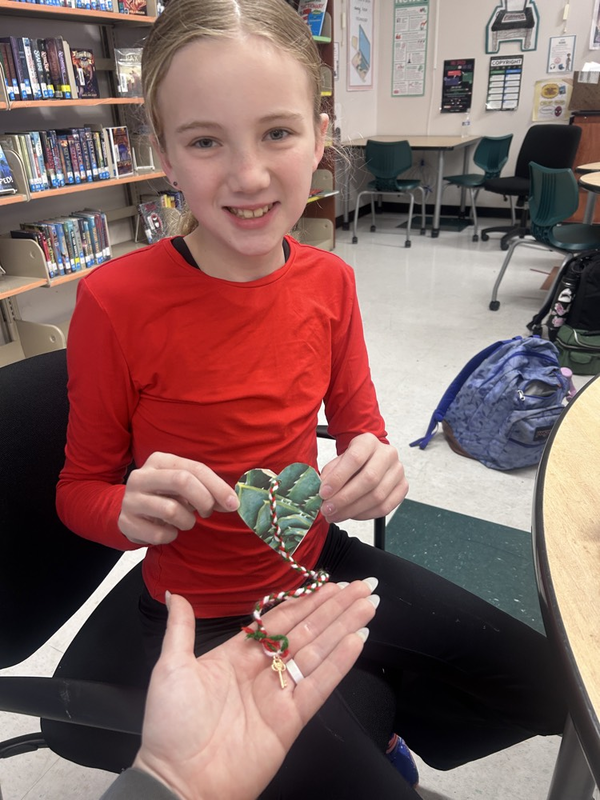 student showcasing her “freedom” bookmark