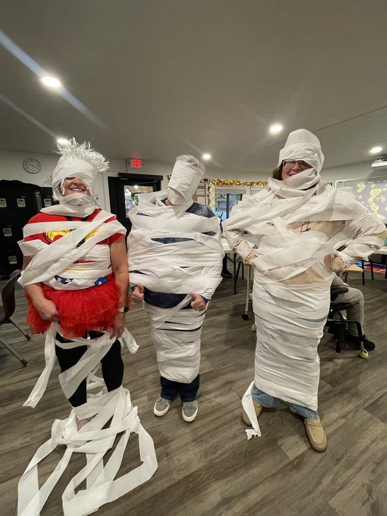 Halloween party games mummy wrap