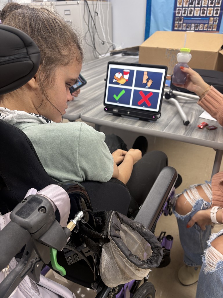 Student with new communication device