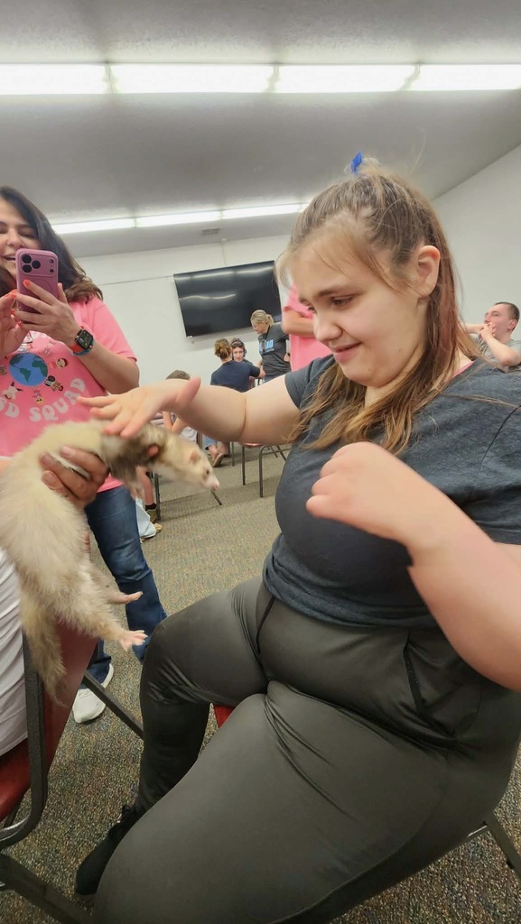 Student with Animal at Petting Zoo