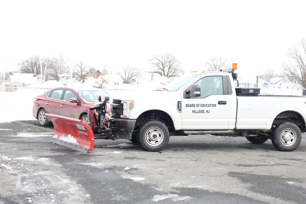 Maintenance cleaning up snow