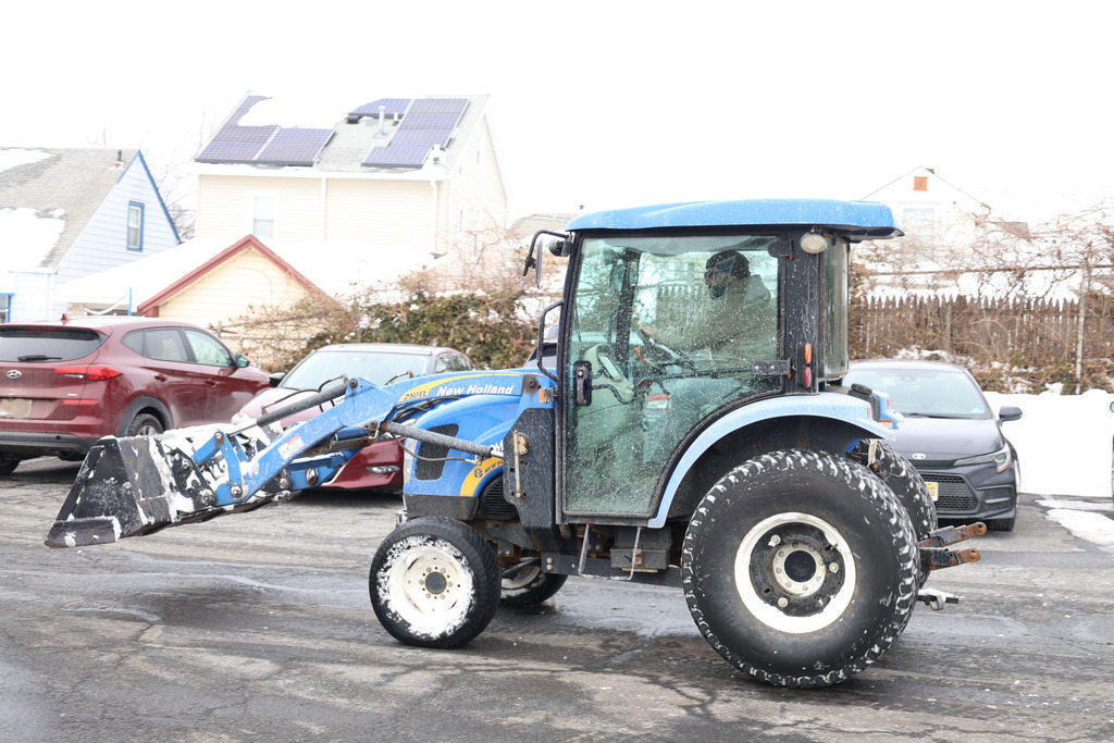 Maintenance cleaning up snow