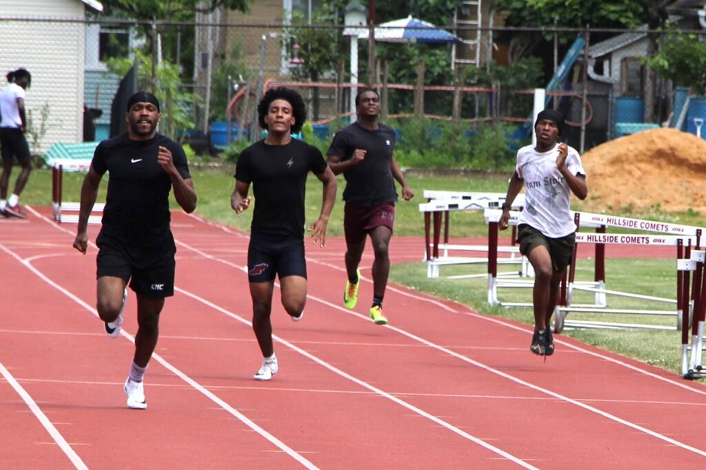 students vs. alumni track meet