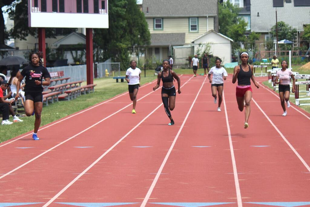 students vs. alumni track meet