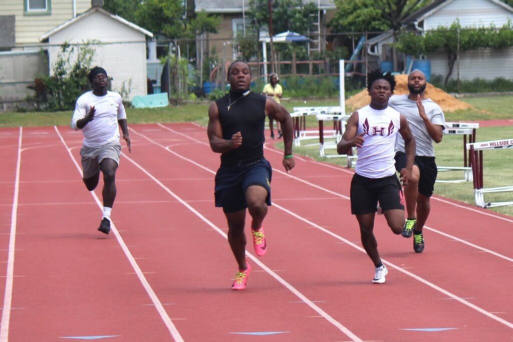 students vs. alumni track meet