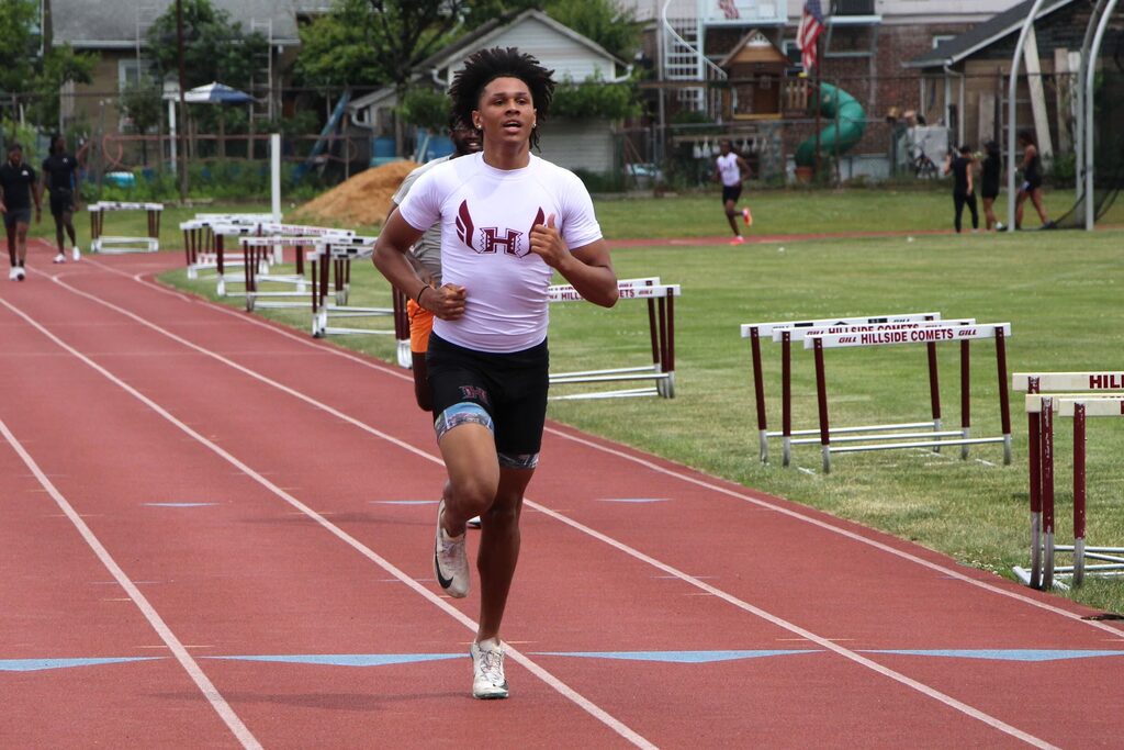 students vs. alumni track meet