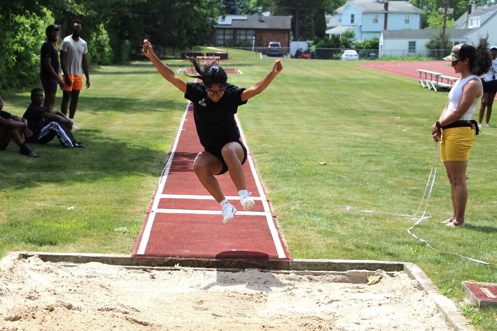 students vs. alumni track meet