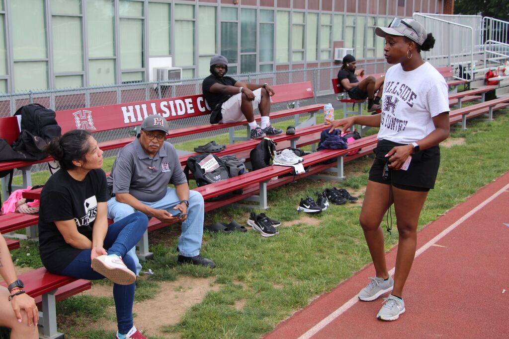 students vs. alumni track meet