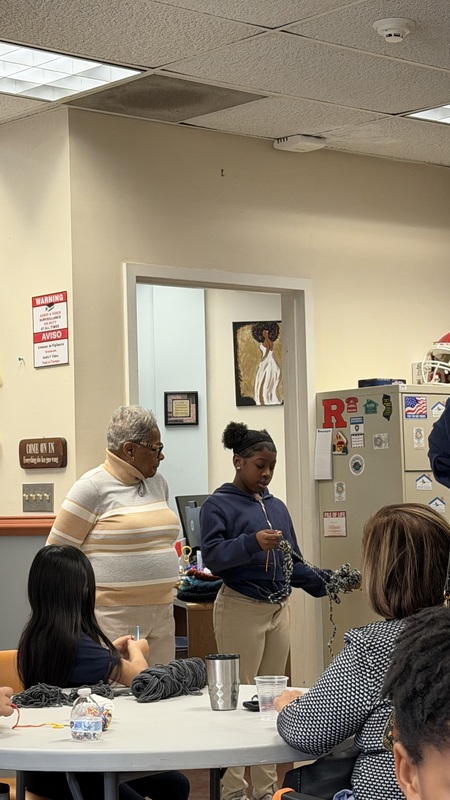 girl showing knitting 