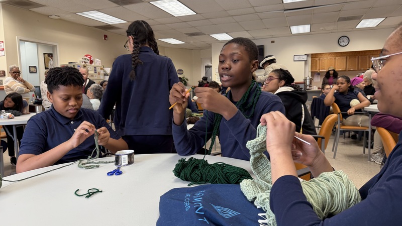 students on the bus , table and with seniors